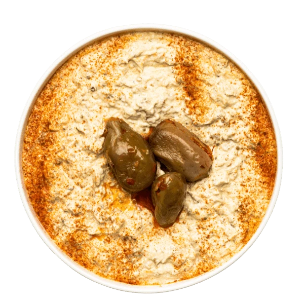 Baba ganoush which is made from roasted eggplant with tahiny in white bowl